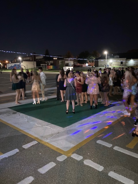dancing in the parking lot